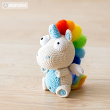 Load image into Gallery viewer, Unicorn Corki from “AradiyaToys Design” collection / unicorn crochet pattern by AradiyaToys (Amigurumi tutorial PDF file)
